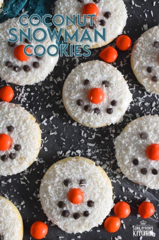 Coconut Snowman Cookies are simply adorable! They're also very easy to make, inexpensive, and delicious too! The base of the cookie melts in your mouth! Using mini chocolate chips for his eyes and mouth, and an orange candy-coated chocolate for his nose, these cookies are almost too cute to eat! #snowman #coconut #cookies #sugarcookies
