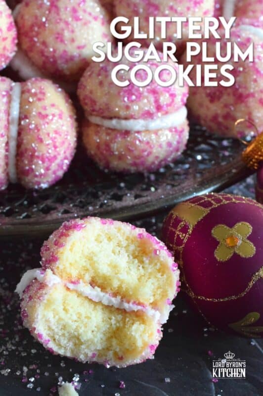 These beautiful, shimmering, Glittery Sugar Plum Cookies are the epitome of priceless luxury on a dollar store budget.The cookies are baked with a sparkling, sugary coating and sandwiched together with an easy, sweet frosting. One bite and you'll certainly have visions of these sugar plums dancing in your head on Christmas Eve night! #sugarplums #christmas #baking #cookies #glitter