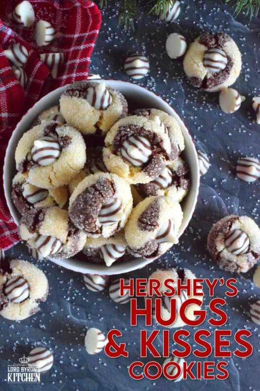 A deliciously decadent half vanilla and half chocolate cookie, coated in sugar, and topped with a chocolate kiss, Hershey’s Hugs and Kiss Cookies are a perfect holiday treat that everyone will love! These are quick and easy - no need to chill the cookie dough before baking either! Don't they look absolutely adorable!? #hershey #hugsandkisses #christmas #cookies