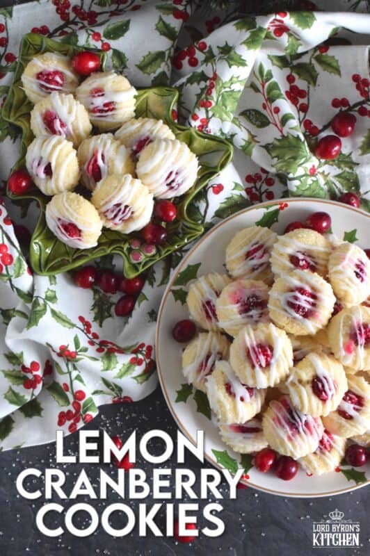 These mini, bite-sized Lemon Cranberry Cookies are prepared with a lightly sweetened vanilla cookie dough and topped with a sugary, sweet glaze. Don't worry - the tartness of both the lemon and the cranberry can easily stand up to the sweetness! #lemoncranberry #cranberry #cranberries #cookies