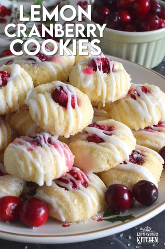 These mini, bite-sized Lemon Cranberry Cookies are prepared with a lightly sweetened vanilla cookie dough and topped with a sugary, sweet glaze. Don't worry - the tartness of both the lemon and the cranberry can easily stand up to the sweetness! #lemoncranberry #cranberry #cranberries #cookies