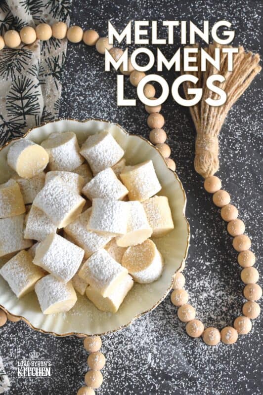 These light and fluffy cookies are prepared with cornstarch, which is what gives them that melt-in-your-mouth texture.  Simply flavoured with a bit of vanilla extract, confectioner's sugar, and butter, Melting Moment Logs are easy to prepare and must be featured in your holiday baking this year! #melting #meltingmoments #cookies #holiday #baking
