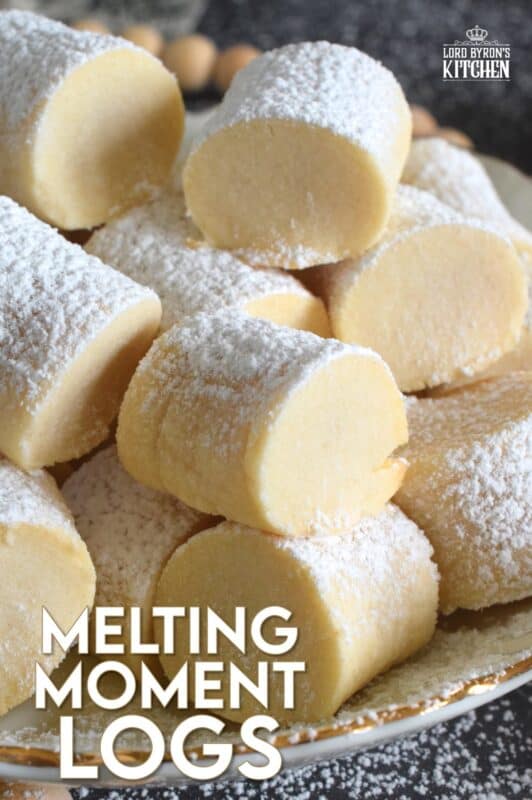 These light and fluffy cookies are prepared with cornstarch, which is what gives them that melt-in-your-mouth texture.  Simply flavoured with a bit of vanilla extract, confectioner's sugar, and butter, Melting Moment Logs are easy to prepare and must be featured in your holiday baking this year! #melting #meltingmoments #cookies #holiday #baking