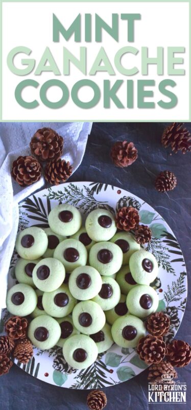 Mint Ganache Cookies are not only beautiful and tinted pastel green, they are deliciously flavoured with mint and topped with a silky, smooth, creamy mint ganache.  Unlike most ganache recipes, this one is prepared with butter, which keeps it shiny and velvety! #mint #ganache #thumbprint #christmascookies