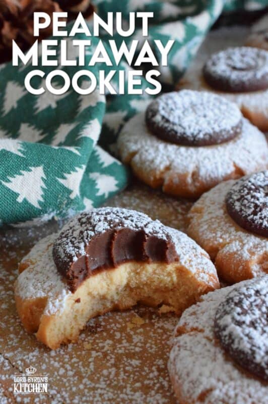 Peanut Meltaway Cookies are a melt-in-your-mouth cookie prepared with peanut butter and topped with a chocolate peanut butter ganache.  Doesn't that sound delicious!?  The base has a shortbread, crumbly-like texture that pairs extraordinarily well with the creaminess of the smooth ganache dollop.  These are simply irresistible! #meltaway #peanutbutter #ganache #cookies