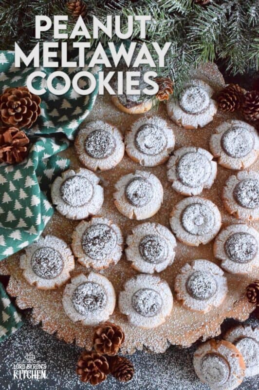 Peanut Meltaway Cookies are a melt-in-your-mouth cookie prepared with peanut butter and topped with a chocolate peanut butter ganache.  Doesn't that sound delicious!?  The base has a shortbread, crumbly-like texture that pairs extraordinarily well with the creaminess of the smooth ganache dollop.  These are simply irresistible! #meltaway #peanutbutter #ganache #cookies