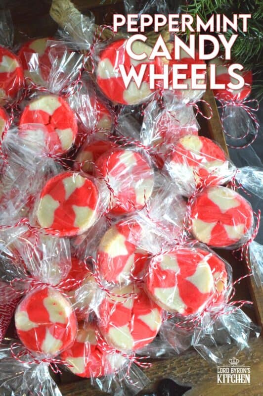 The perfect gift-giving cookie, Peppermint Candy Wheels are individually wrapped in cellophane and tied with a festive string. They may look impressive and maybe even tedious and time consuming, but these cookies really couldn't be easier! And besides, whomever you share these with will certainly appreciate the effort! #peppermint #cookies #candies #redandwhite