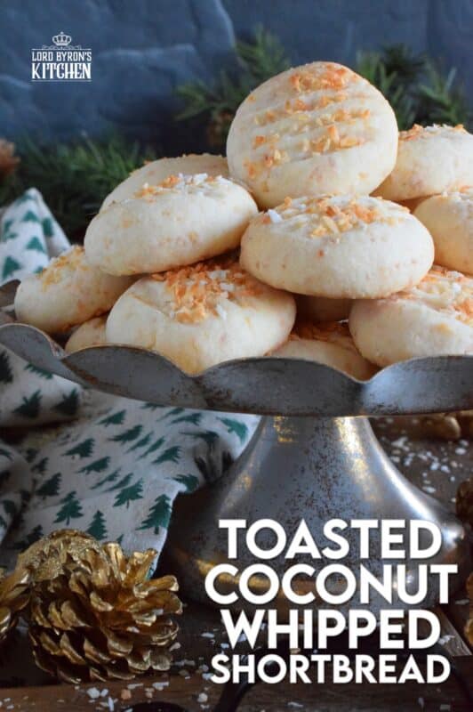 Christmas isn't Christmas without shortbread, and while everyone seems to have a favourite shortbread recipe or two, there's always room for one more! Toasted Coconut Whipped Shortbread pairs an easy whipped shortbread cookie recipe with the wonderful taste of golden, toasted coconut, making this a must-bake cookie this holiday season! #coconut #shortbread #toasted #cookies