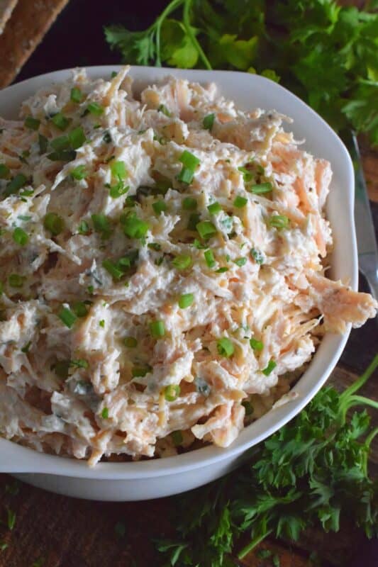 Prepared with poached chicken breasts or your favourite canned, flaked chicken, Deviled Chicken is a wonderful spread on crackers, a great addition to any charcuterie board, or a delicious start to a delightful sandwich. #deviled #chicken #salad #appetizer #pate #spread #canned #poached
