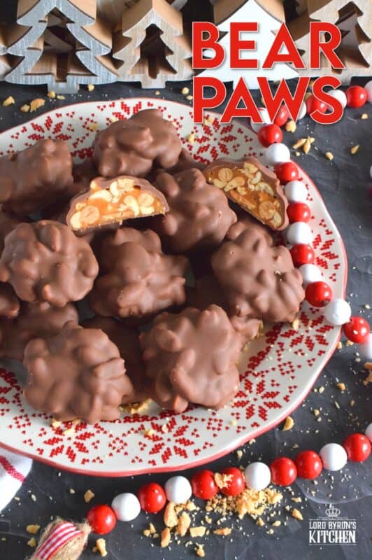 A quick and easy candy with so much delicious flavour! Melted milk chocolate coats a mound of thick and gooey caramel and salted peanut goodness. One bite of these Bear Paws is all it takes to win over just about anyone! #bearpaws #caramel #nuts #nobake
