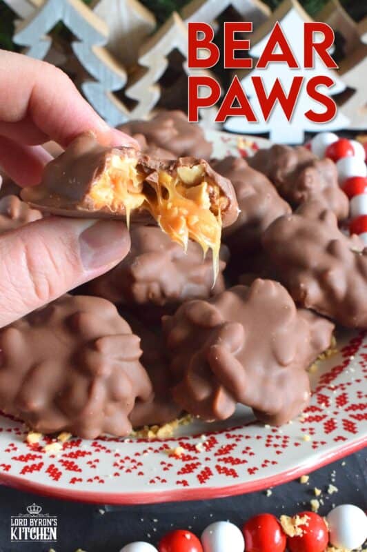 A quick and easy candy with so much delicious flavour! Melted milk chocolate coats a mound of thick and gooey caramel and salted peanut goodness. One bite of these Bear Paws is all it takes to win over just about anyone! #bearpaws #caramel #nuts #nobake