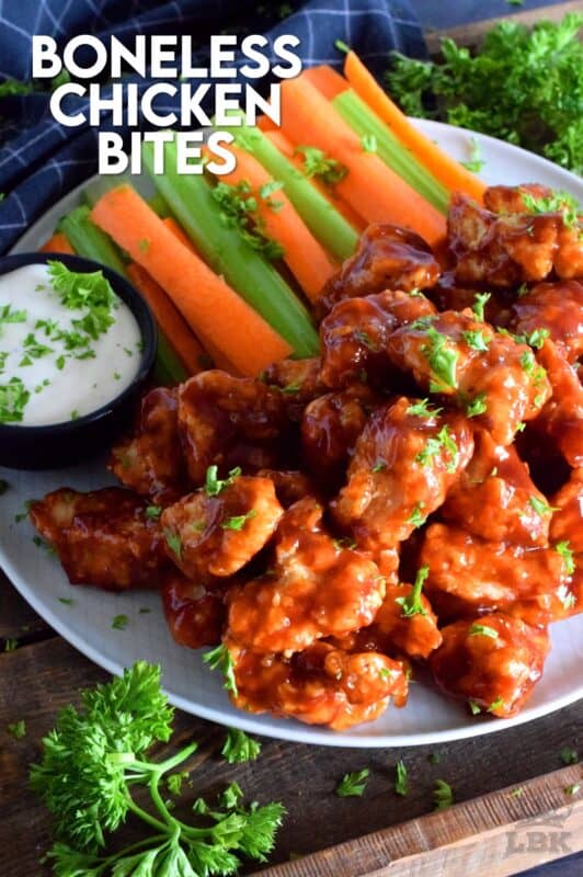 Crispy, fried, battered chicken tossed in your favourite prepared barbecue sauce, Boneless Chicken Bites are a perfect party food. Serve with fresh veggies, dip, and lots of toothpicks. There's no need to get your fingers dirty here! #bonelesschicken #barbecuechicken #BBQ #weeknightrecipes