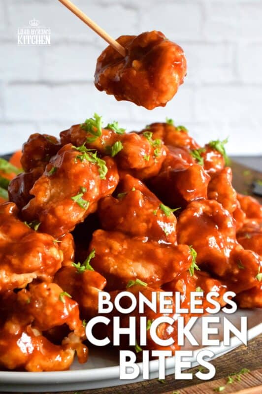 Crispy, fried, battered chicken tossed in your favourite prepared barbecue sauce, Boneless Chicken Bites are a perfect party food. Serve with fresh veggies, dip, and lots of toothpicks. There's no need to get your fingers dirty here! #bonelesschicken #barbecuechicken #BBQ #weeknightrecipes