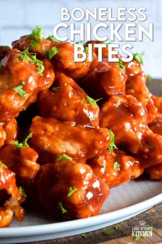 Crispy, fried, battered chicken tossed in your favourite prepared barbecue sauce, Boneless Chicken Bites are a perfect party food. Serve with fresh veggies, dip, and lots of toothpicks. There's no need to get your fingers dirty here! #bonelesschicken #barbecuechicken #BBQ #weeknightrecipes