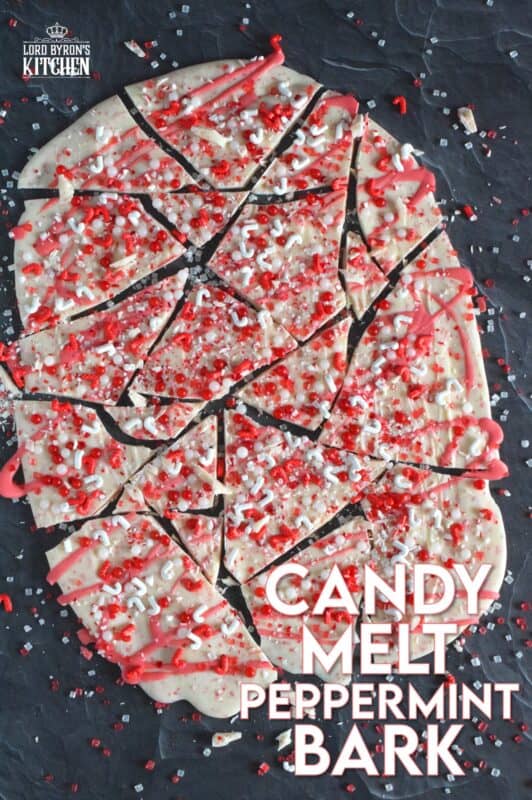 Chocolate bark is the name applied to a thin layer of melted chocolate that has been topped or filled with nuts, cookies, candies, pretzels, etc., and it is supposed to resemble tree bark. Candy Melt Peppermint Bark is prepared with crushed candy canes, peppermint-flavoured white candy melts and lots of festive sprinkles. This sweet treat is quick and easy to make and perfect for gift-giving! #candymelts #peppermint #chocolate #bark
