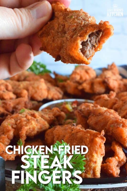 Steak is marinated in buttermilk and seasonings to tenderize and flavour before being double coated in a light batter. The steak is fried until golden and crunchy on the outside but is still moist and tender on the inside. Chicken Fried Steak Fingers have the flavour and crunch of fried chicken but with steak instead! #steakfingers #chickenfried #steak #ribeye #fingers #deepfried