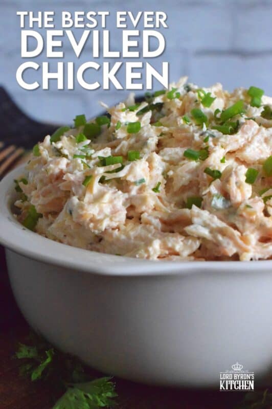 Prepared with poached chicken breasts or your favourite canned, flaked chicken, Deviled Chicken is a wonderful spread on crackers, a great addition to any charcuterie board, or a delicious start to a delightful sandwich. #deviled #chicken #salad #appetizer #pate #spread #canned #poached