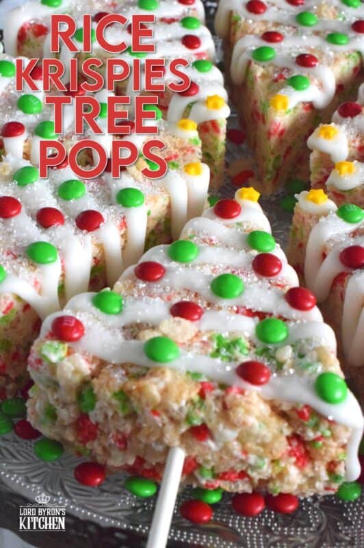 Marshmallow Rice Krispie Treats are prepared in a round cake pan and cut into large wedges.  Insert a lollipop stick and decorate as you wish!  These Festive Christmas Tree Pops are such fun to prepare and super delicious too! #ricekrispie #trees #christmas #pops