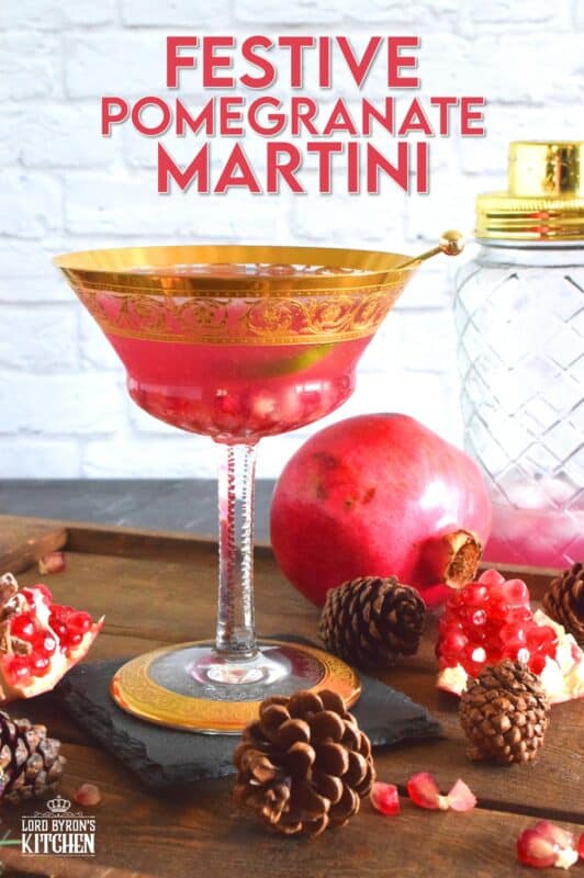 This gorgeous cocktail is prepared with gin and pomegranate juice. With a little bit of simple syrup for sweetness and a splash of fresh lime juice, this Festive Pomegranate Martini is full of zing and pizzazz! #christmas #drinks #cocktails