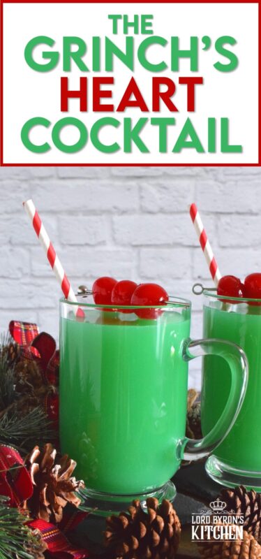 A Grinch's Heart Cocktail would most certainly warm the Grinch's cold heart! Prepared with peach schnapps, rum, orange juice, curacao, and soda, this drink will make you feel all cozy inside! #cocktail #drinks #christmas