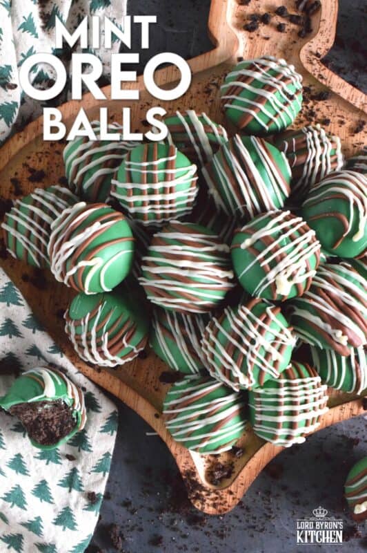Otherwise known as truffles, these Mint Oreo Balls are prepared with crushed mint-flavoured Oreos and cream cheese. They are dipped in melted green candy melts and drizzled with milk and white melted chocolate. They're bright, beautiful, festive, and delicious! #oreo #truffles #balls #nobake #christmas