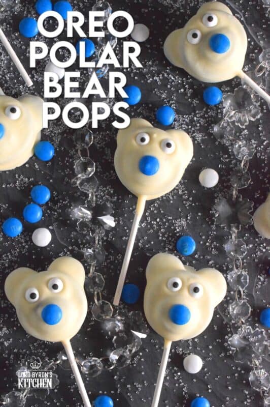 These adorable Oreo Polar Bear Pops are such a delight to make! This assembly-type recipe comes together quite easily and is a perfect holiday treat for the whole family, so get your kids involved too! No baking required; all you need to do is melt the chocolate and you're ready to go! #oreo #pops #polarbear #treat