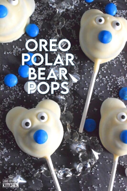 These adorable Oreo Polar Bear Pops are such a delight to make! This assembly-type recipe comes together quite easily and is a perfect holiday treat for the whole family, so get your kids involved too! No baking required; all you need to do is melt the chocolate and you're ready to go! #oreo #pops #polarbear #treat