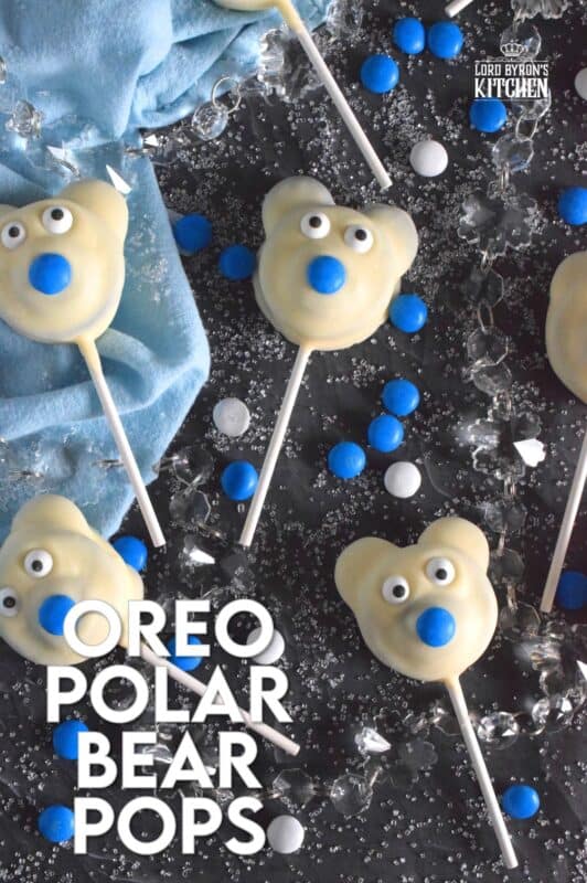 These adorable Oreo Polar Bear Pops are such a delight to make! This assembly-type recipe comes together quite easily and is a perfect holiday treat for the whole family, so get your kids involved too! No baking required; all you need to do is melt the chocolate and you're ready to go! #oreo #pops #polarbear #treat