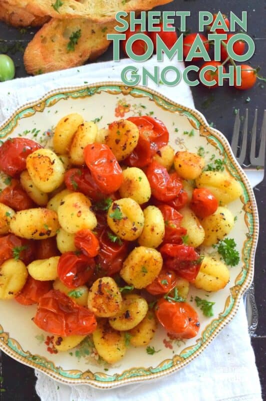 This 30-minute dinner, prepared with fresh tomatoes, is delicious any time of the year not just during tomato growing season. Sheet Pan Tomato Gnocchi is a toss-and-bake type of recipe that requires no supervision at all. If you're hungry and in a hurry, this should be your go-to meal every single time! #gnocchi #tomatoes #sheetpan #dinner #vegetarian
