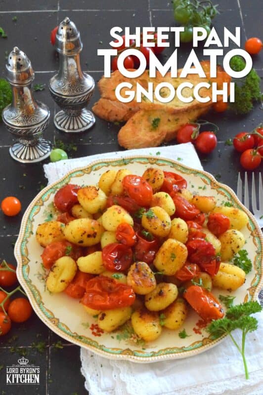 This 30-minute dinner, prepared with fresh tomatoes, is delicious any time of the year not just during tomato growing season. Sheet Pan Tomato Gnocchi is a toss-and-bake type of recipe that requires no supervision at all. If you're hungry and in a hurry, this should be your go-to meal every single time! #gnocchi #tomatoes #sheetpan #dinner #vegetarian