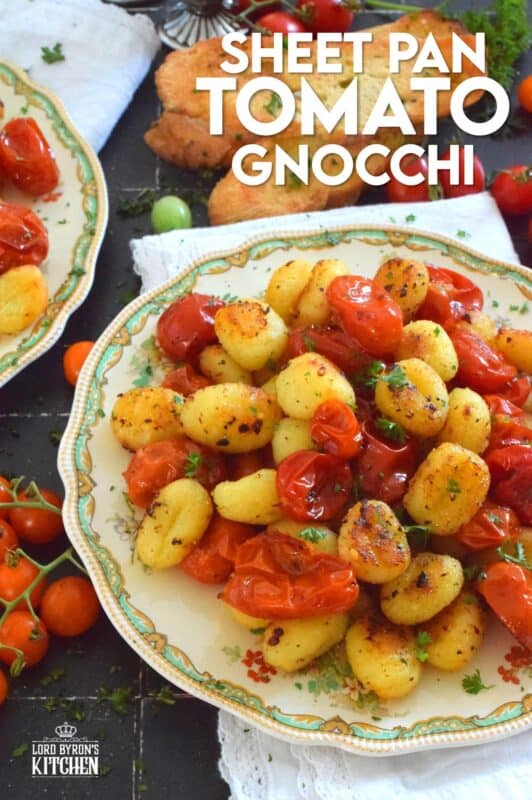 This 30-minute dinner, prepared with fresh tomatoes, is delicious any time of the year not just during tomato growing season. Sheet Pan Tomato Gnocchi is a toss-and-bake type of recipe that requires no supervision at all. If you're hungry and in a hurry, this should be your go-to meal every single time! #gnocchi #tomatoes #sheetpan #dinner #vegetarian