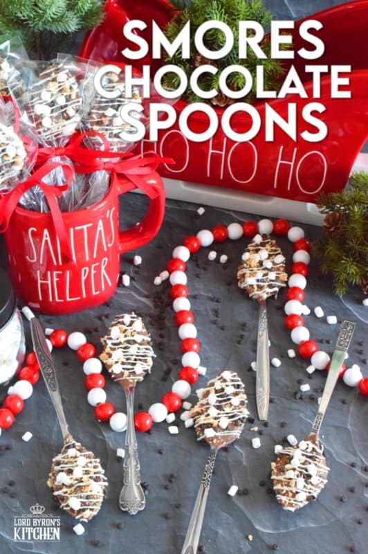 The ultimate rich and indulgent treat can be summed up in three words – S’mores Chocolate Spoons! Melted milk chocolate is topped with classic s'mores ingredients like marshmallows, cookies, and graham crackers. Stir a cup of hot chocolate with one of these spoons while watching your favourite holiday movie! They make a great gift idea too! #smores #stir #spoons