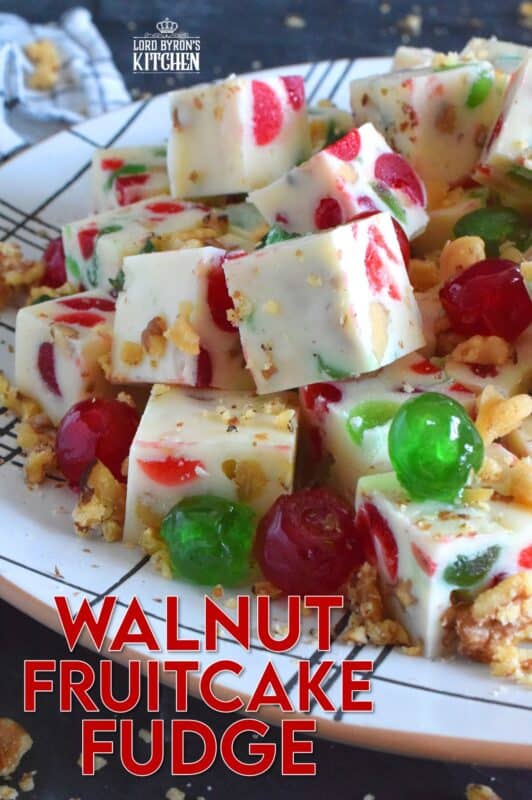 This no-bake fudge recipe is packed full of red and green candied cherries and chopped toasted walnuts. Made with melted white chocolate and canned sweetened condensed milk, Walnut Fruitcake Fudge is super easy and fast to make and tastes delicious too! #fudge #candied #cherries #nobake #fruitcake