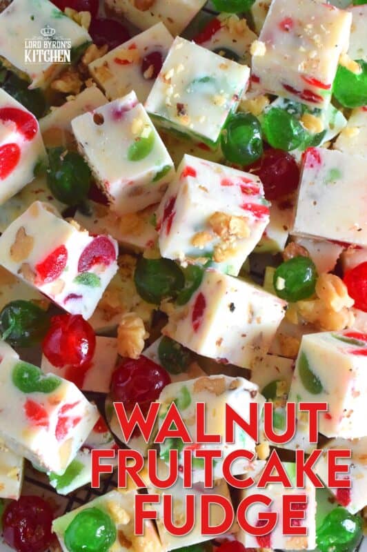 This no-bake fudge recipe is packed full of red and green candied cherries and chopped toasted walnuts. Made with melted white chocolate and canned sweetened condensed milk, Walnut Fruitcake Fudge is super easy and fast to make and tastes delicious too! #fudge #candied #cherries #nobake #fruitcake