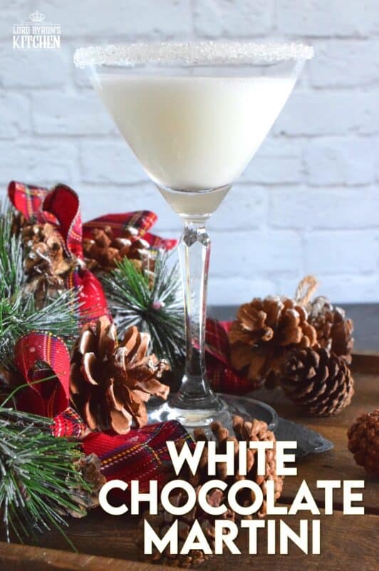 What's not to love about this White Chocolate Martini cocktail? It's prepared with vodka, chocolate liqueur, white creme de cacao, and a splash of milk. Also, it's creamy smooth and so pretty too! #cocktails #drinks #martini