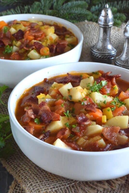 German Potato Soup starts off with bacon, which is a great start to any recipe! Loaded with lots of root vegetables like onions, potatoes, celery root, and carrots, this soup also has leeks, which is a wonderful addition to any soup! Hearty and filling, this soup recipe is certainly a keeper! #soup #german #bacon