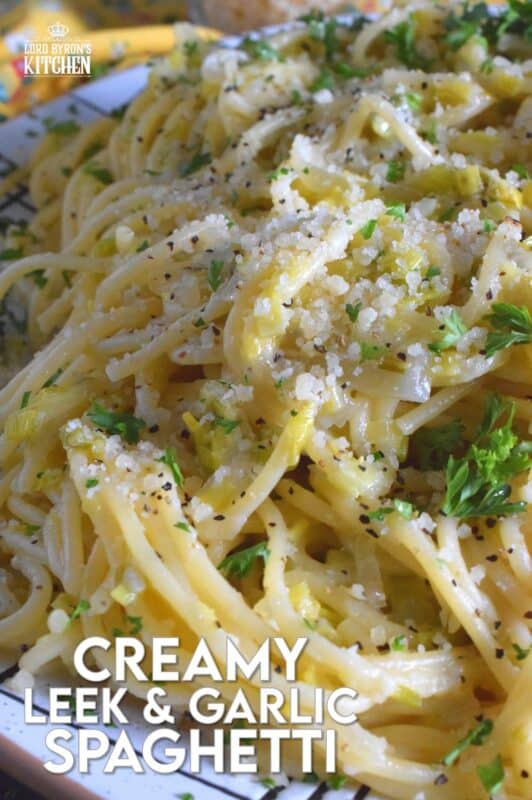 Sweet oniony leeks are paired with garlic, parmesan, and butter in this rustic and delicious Creamy Leek and Garlic Spaghetti. This recipe, although vegetarian, is hearty and filling and can be on your dinner table in thirty minutes or less! #leek #spaghetti #pasta #vegetarian