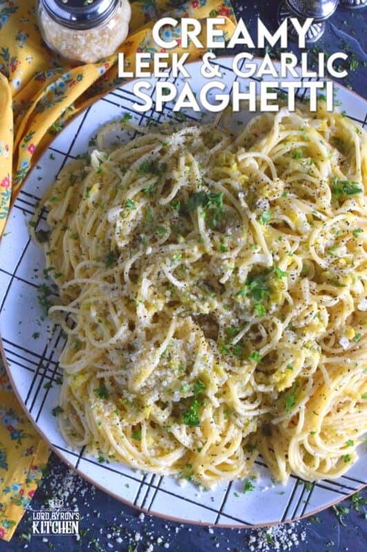 Sweet oniony leeks are paired with garlic, parmesan, and butter in this rustic and delicious Creamy Leek and Garlic Spaghetti. This recipe, although vegetarian, is hearty and filling and can be on your dinner table in thirty minutes or less! #leek #spaghetti #pasta #vegetarian