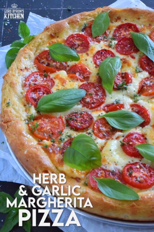 One of the best pizza combinations is the Margherita which is simply prepared with sauce, tomatoes, cheese, and basil. Herb and Garlic Margherita Pizza ups the flavour profile with an easy, savoury, homemade pizza dough filled with dried herbs and spices.  You have to try this! #margherita #pizza #homemade