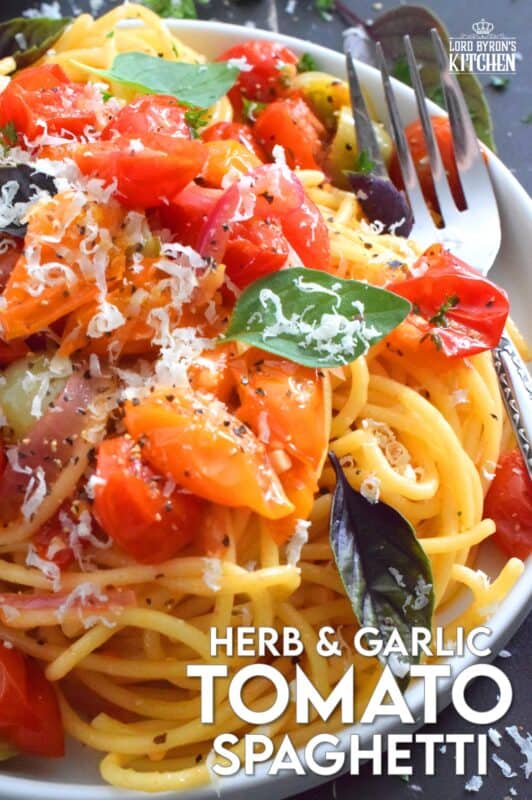 Herb and Garlic Tomato Spaghetti is one of those quick and easy recipes that taste wonderfully delicious! This simple pasta is prepared using fresh herbs like thyme, oregano, and chives.  Cherry tomatoes are blistered with red onions in olive oil to create a sauce. Tossed with perfectly cooked pasta, this dish is a family-friendly meal, but impressive enough for any dinner party! #herbs #pasta #tomatoes #spaghetti