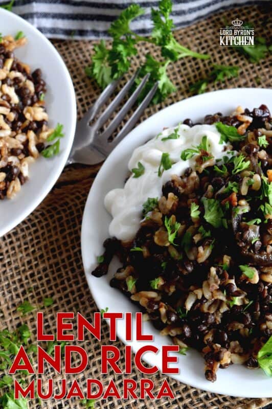 Mujadarra, a classic Middle Eastern dish, consists of black lentils, brown rice, and caramelized red onions. In all probability, you have everything you need to make this dish in your fridge and pantry already! Be sure to serve it up with a little sour cream for a new favourite easy and unique side or main. #middleeastern #mujadarra #lentils