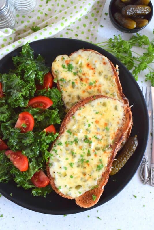 Otherwise known as cheese toast, rarebit is prepared with cheese sauce rather than cheese slices like the popular North American grilled cheese. Irish Gherkin Rarebit has pickles too, which is why it just might be my favourite! Cheap and easy, serve these with a side salad and extra gherkins for a complete meal! #rarebit #irish #ireland #stpatricksday #gherkin #cornichon