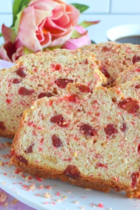 Made with a few simple ingredients, like flour, baking soda, sugar, and buttermilk, Easy Strawberry Shortcake Bread is a great introduction to bread baking, and the reward is delicious! Served warm with hot coffee or tea, or as the base for French Toast, this bread is just perfect! #strawberry #shortcake #bread #dessert #valentine