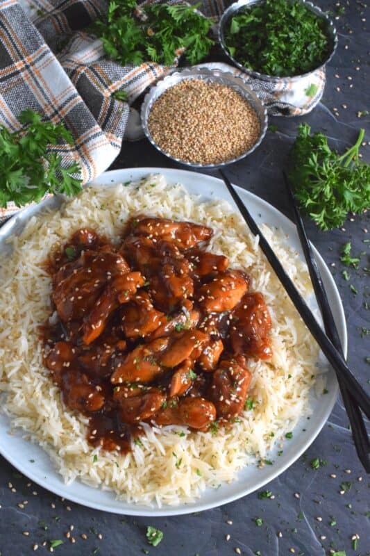 Sweet and sticky, garlicky and gingery, Japanese Yakitori Chicken is first marinated and then pan-fried with the most delicious, savoury sauce. Traditionally prepared on skewers, this version uses only a stovetop. It's quicker and easier, which makes it a great weeknight dinner option! #yakitori #japanese #chicken