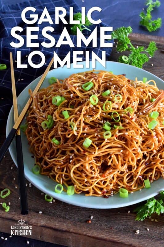 A quick and easy Asian noodle side dish, Garlic Sesame Lo Mein is loaded with classic garlic and ginger flavour, as well as nutty toasted sesame seeds. Make it as spicy or as mild as you want with dried red chilies! #Asian #garlic #sesame #noodles #lomein #mein #Chinese #homemade
