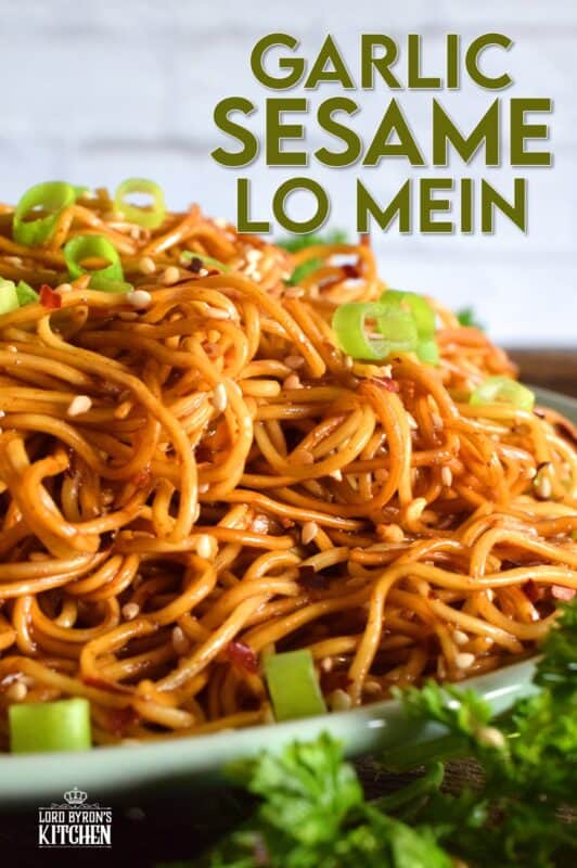 A quick and easy Asian noodle side dish, Garlic Sesame Lo Mein is loaded with classic garlic and ginger flavour, as well as nutty toasted sesame seeds. Make it as spicy or as mild as you want with dried red chilies! #Asian #garlic #sesame #noodles #lomein #mein #Chinese #homemade