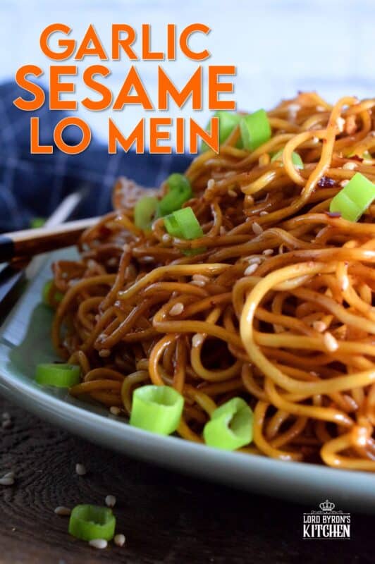 A quick and easy Asian noodle side dish, Garlic Sesame Lo Mein is loaded with classic garlic and ginger flavour, as well as nutty toasted sesame seeds. Make it as spicy or as mild as you want with dried red chilies! #Asian #garlic #sesame #noodles #lomein #mein #Chinese #homemade
