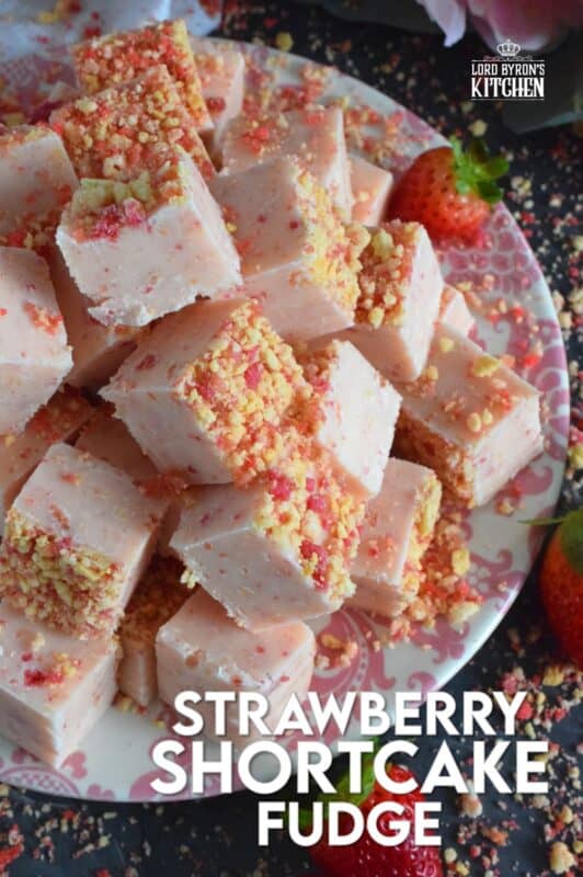 This no-bake fudge recipe is packed full of homemade strawberry shortcake crumbs. Made with melted white chocolate, Strawberry Shortcake Fudge is super easy and fast to make and tastes delicious too! Perfect for sharing with your favourite valentines! #strawberry #shortcake #fudge #nobake #valentine