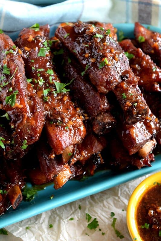 Copycat Chinese Restaurant Dry Garlic Ribs are a nostalgic buffet favourite. Every 80s and 90s Chinese buffet included these delicious ribs and this is a make-at-home recipe that's better than the original! Get ready, because one taste of these ribs and you'll be transported back in time!! #ribs #dry #garlic #chinese #restaurant #buffet #copycat #recipe