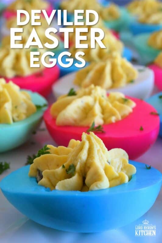 Easter isn't Easter without boiled eggs, so why not have some fun and make a batch of very Easter-y and very colourful Deviled Easter Eggs!? Don't hide these around the house and give the Easter Bunny all the credit! #deviledeggs #eastereggs #easter #deviled #boiledeggs #dyedeggs